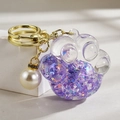 Purple glitter cat paw acrylic keychain with gold ring and pearl charm accessory - Luminous Pearl Paw Style / Purple