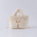 Creamy white faux fur shoulder bag with golden reindeer horn charm and chain strap - Beige