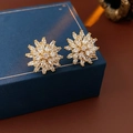 Elegant gold sunflower earrings with marquise cubic zirconia on a luxury blue box - Sunflower Shaped Zircon Studs (64# Silver Earring Post)