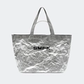 Macro shot of silver metallic gym bag texture with black logo and top zipper - Space Silver