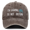 Close-up of gaming embroidery and washed brown cotton texture on the baseball cap - Coffee