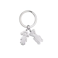 Polished silver stainless steel keychain featuring a cartoon girl and a cute dog pendant - 1 Dog 1 Girl / Silver