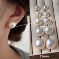 Elegantes pendientes de perla blanca de 12mm en varios tamaños sobre exhibidor - US 12 / Rosa