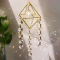 Golden suncatcher with moon and star accents, geometric frame and crystal prism ball - US 13