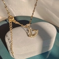 Elegant gold fan-shaped necklace with zircon stones on a textured surface - Titanium Steel/Zircon / X632 Gold Zirconia Fan