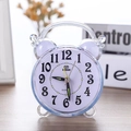 Classic round quartz alarm clock with silver finish and easy-to-read numeric display - Pink Mini Round Alarm Clock