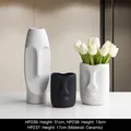Modern face-shaped matte ceramic vase set in black and white finishes - Face-covered Three-flower Vase Ornament