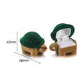 Detail view of a turtle-shaped jewelry box showing green velvet texture and dimensions - Turtle Green