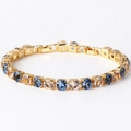 6mm gold tennis bracelet featuring multi-colored round-cut zircon stones with fold-over clasp - Blue & White Zirconia Gold
