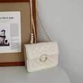 Detail of cream quilted PU bag with pearl ring buckle and golden chain strap - Small / Off White