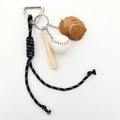 Detailed view of baseball keychain with mini bat, ball, glove, and braided nylon rope - Black Rope + Baseball