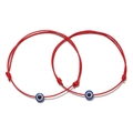 Detail of red woven bracelets featuring blue evil eye beads and adjustable slip knots - 2Pcs Set/Red String (ZJ7770)