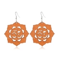 Detail of lotus flower wooden earrings featuring a hollow carved Om symbol with metal hooks - Style 11/Lotus Om Symbol Hollow