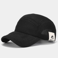 Detail of breathable black mesh paneling and outdoor travel woven label on baseball cap - Black