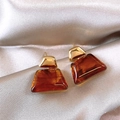 Detailed view of 18K gold plated geometric resin earrings on a silk background - Trapezoid Geometric Patchwork (Style 9 Silver Needle)