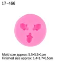 Pink round silicone mold featuring three small honey bee cavities for DIY cake decorating - Bee / Pink