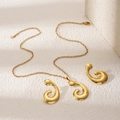 Exquisite golden jewelry set featuring abstract curved leaf earrings and a matching necklace - Abstract Curly Style (E4766-1)