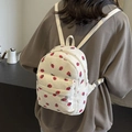White corduroy mini backpack for women featuring cute red strawberry patterns - Off White