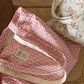 Detail of cotton tote bags featuring red bow prints and vintage floral patterns - Rose Pink Fine Bow