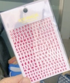 Macro shot of 3D rose red alphabet nail stickers featuring vintage letters and model WG719 - Red (WG719)