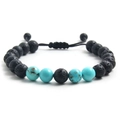 Adjustable braided bracelet with black lava rocks and blue turquoise beads on white background - Turquoise + Lava Stone (NR09-6)