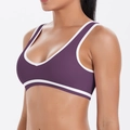 Side view detail of purple sports bra with white trim and high elasticity fabric - S / Giga Purple