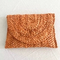 Handmade orange woven straw clutch bag in envelope style for summer beach vacations - Orange