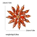 Detailed view of orange crystal flower brooch with gold base, 2.6cm size and 8g weight specs - Red
