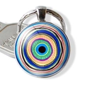 Macro shot of silver metal Evil Eye keychain pendant with colorful glass texture insert - Colorful Concentric (JY006346-9)