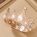Macro detail of golden tiara featuring white faux pearls and colorful crystal rhinestones - Vintage Kids Rose Gold 01