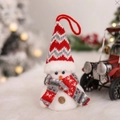 Pupazzo di neve natalizio in peluche con cappello a maglia rosso e sciarpa a fiocchi - Pupazzo di neve con luce
