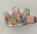 Crown shaped hair clip with colorful flower sequins and pink fabric wrapped base - Crown
