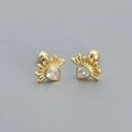Golden heart-shaped stud earrings with sparkling zircon and screw back closure - 925 Silver / Gold