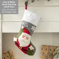Gray and white Christmas stocking with 3D Santa and snowflake patterns, hanging by a fireplace - Large 3D Santa Style (Grey/White)