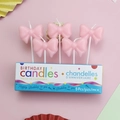Five-pack of pink bow birthday candles with polka dots for princess party decorations - Pink Bowknot