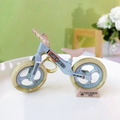 Mini macaron blue balance bike keychain with 'Super Speed' print and pink seat - Bicycle Keychain - Light Green