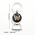 Detail view of butterfly bottle opener keychain with size and weight measurements - Letter Q