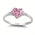 Women's heart-shaped ring featuring a pink heart-cut gemstone set in polished silver metal - Pink