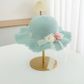 Detail of mint green straw hat with 3D floral accents and wavy brim for girls - Hat / Blue