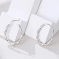 Minimalist S925 sterling silver hoop earrings featuring irregular wave texture design - 925 Silver / White Gold
