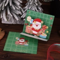 Detailed view of a 3D pop-up Christmas card featuring Santa Claus and gold stamping - Santa Claus