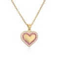 Collier cœur doré avec halo de zircons roses et blancs sur fond blanc avec reflet - Pendentif Cœur Halo en Pierres Précieuses Roses et Blanches