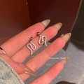 Exquisite silver snake stud earrings with small transparent diamonds and pearl accents - A1365 Silver Snake Shaped Zirconia Stud Earrings