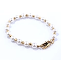 Elegante bracciale di perle con perline in acciaio inossidabile dorato e moschettone - Colore Oro (Chiusura a Moschettone)
