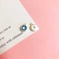 Detailed view of silver donut charms with blue enamel finish for DIY jewelry making - 8# Blueberry Doughnut Matte Silver
