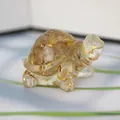 Golden foil fragments embedded in transparent turtle resin sculpture ornament - Yellow Gold Rutilated + Gold Foil