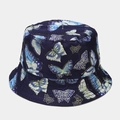 Détail du chapeau bob bleu marine avec papillons dorés et aspect satiné élégant - M (56-58cm) / Bleu foncé