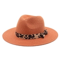Detail of orange woven straw Fedora hat featuring a stylish leopard print silk ribbon bow - M (56-58cm) / Caramel