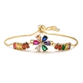 Pulsera ajustable de cobre bañada en oro de 18K con flores de circonitas de colores - Estilo Flor Multicolor