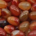Egg shaped 30mm natural red agate stones with polished finish and unique white texture - Red Agate (1pc)